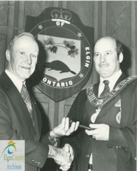 Image of Ken Monteith receiving warden's gavel in 1981 from Lester Longhurst