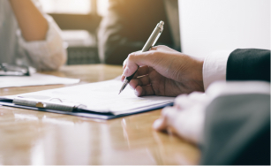 Person signing a document