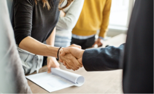 Two people shaking hands